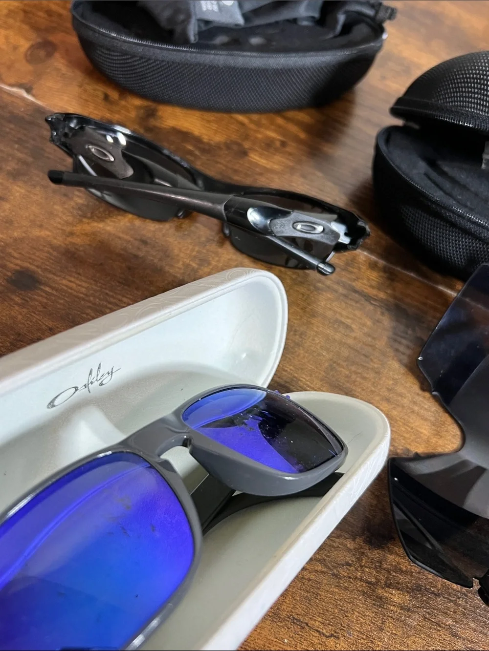 Lot of 3 Oakley Gray Sunglasses with Purple Accents and White Case